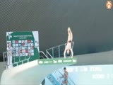 Guy Runs Past Security And Jumps Off A Diving Platform During A Competition!