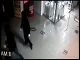 security guards watch as robbers take ATM