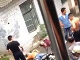 Chinese Police Filmed Beating Two Drunk Men