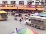 Woman Talking On Her Mobile Knocked Under A Truck By A Van