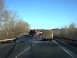 Car Loses Control And Slides Straight Into An Oncoming Truck