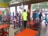 group of armed men notice thief in cafeteria