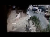 speeding rider slides Under the car