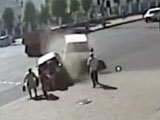 Unlucky Pedestrian Gets Flattened By Car Accident