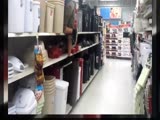 Guy attempts to hit a backflip off a Walmart Shelf, Nearly snaps his neck