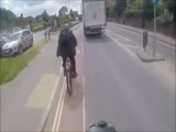 Cycist Gets Instant Karma After Cutting Into Traffic and Flipping Off Motorist