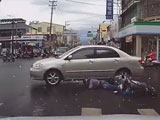 Driver Tests His Suspension On A Scooter Rider