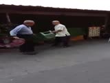 two grandpas fight with chairs