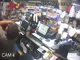 store clerk wounds robber from his own gun