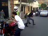 two riders fight with cops