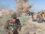 IED Explodes During Live News Interview With Militia Leader