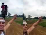 Idiot Taking A Selfie On The Race Track Gets A Bike On His Head