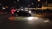 Drifting car hits the rider