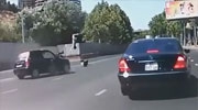 Biker Spins Through The Air When A Car Crosses The Street