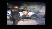 Woman Attacking A Police Car Stopped In Her Tracks By A Taser