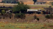 TOW missile hitting man standing next to a truck