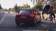 Annoying Cyclist Trying To Overtake A Car Comes Unstuck