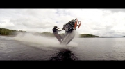 Snowmobile wheelies on water