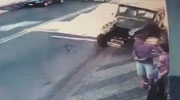 Woman Knocked Down On The Sidewalk By An Out Of Control Jeep