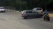 Biker Slams Into A Car So Hard He Almost Flips It Over