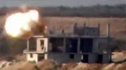 Two Soldiers On A Ruined Building Are Successfully Targeted With A TOW ATGM