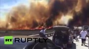 California Inferno Huge fire sweeps over freeway, people run for their lives.