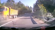 Car drives straight into oncoming truck