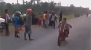 idiot Walks Across The Road During A Motorcycle Race