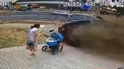 Girl Pushing A Stroller Has A Very Lucky Escape