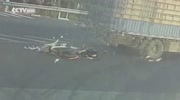 Rider miraculously survived under truck’s wheels