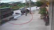 Scooter Rider Slips On Water And Falls Directly Under A Trucks Wheels