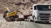 Backhoe Driver Jumps From His Cab While The Backhoe Rolls Over His Head