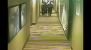 Footage Shows Police Officers Beat Already Handcuffed Man in a Hotel Hallway