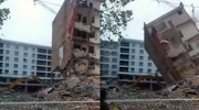 Excavator Makes A Deadly Mistake During Building Demolition