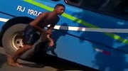 Guy falls from the bus and broke his arm