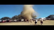 Revellers Dance Around A Small Tornado At A Music Festival, Earthcore