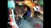 Biker gets runned over by lorry at the parking exit
