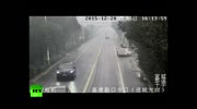 Scooter crashes into oncoming car in China
