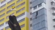 Man Dangling from 15th Floor by His Pants is Rescued by Fellow Residents