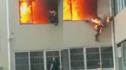 Firefighter Engulfed In Flames Falls From Burning Apartment Window