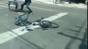Guy takes quick beating for cyclist robbery attempt