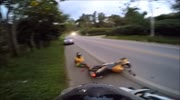 Idiot rider tries to overtake the car and breaks his leg