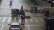 Driver Plows Through A Group Of Bikers Waiting At The Lights