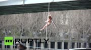 Topless Paris bridge protest
