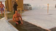 WOW -46 C Orthodox believers plunge into freezing river