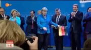 Angela Merkel visibly disgusted by German flag - Throws it away during celebration