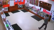 Clerk Steals Robber's Gun During Fight