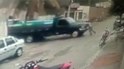 Man Attempting To Be Superman Crushed By Runaway Truck