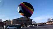 Hot air balloon crashes into building after takeoff