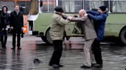 An elderly Ukrainian man uses kung fu to fight